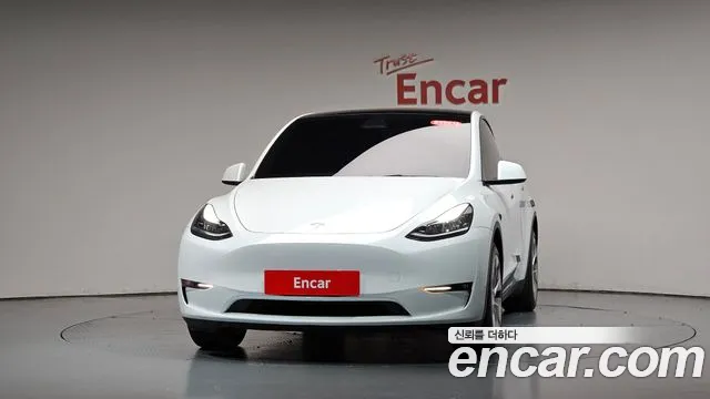 Tesla Model Y — Фото автомобиля 3
