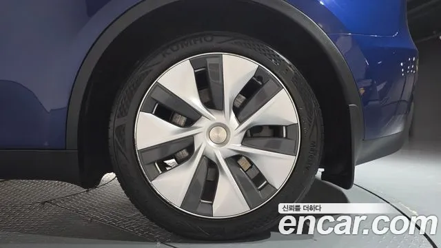 Tesla Model Y — Фото автомобиля 6