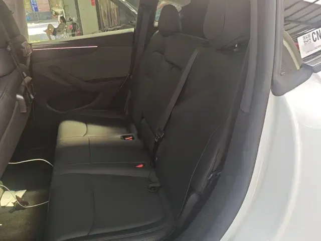 Tesla Model Y — Фото автомобиля 16