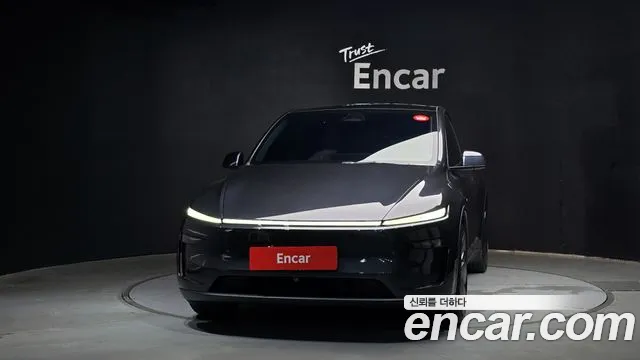 Tesla Model Y — Фото автомобиля 3