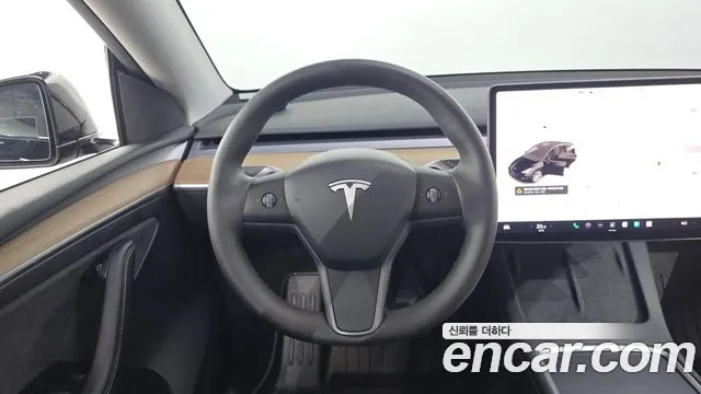 Tesla Model Y — Фото автомобиля 13