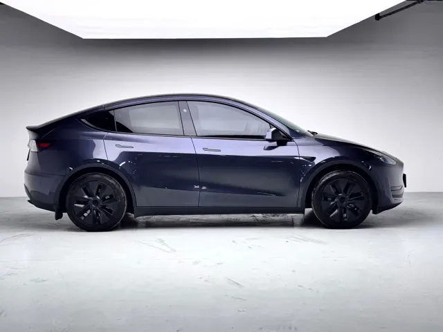 Tesla Model Y — Фото автомобиля 15