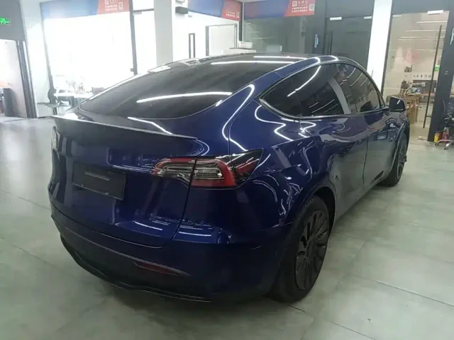 Tesla Model Y — Фото автомобиля 6