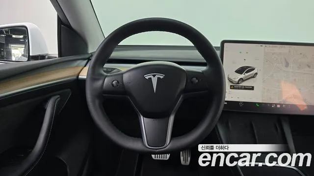 Tesla Model Y — Фото автомобиля 12