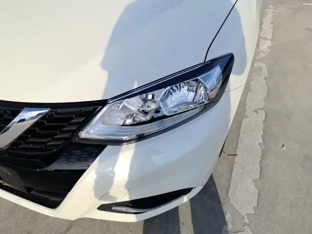 Nissan Tiida — Фото автомобиля 23
