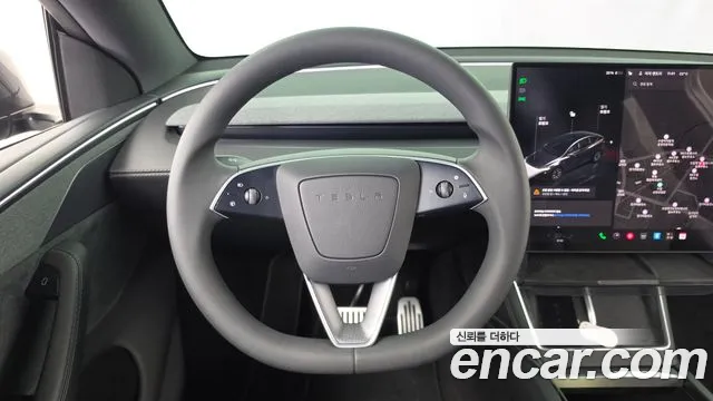 Tesla Model Y — Фото автомобиля 13