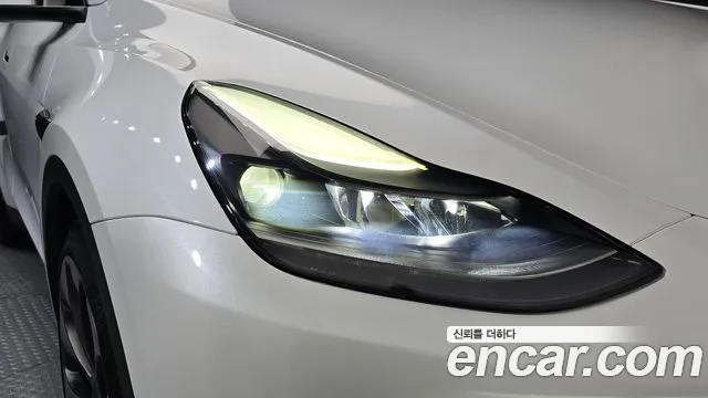 Tesla Model Y — Фото автомобиля 7