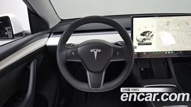 Tesla Model Y — Фото автомобиля 12