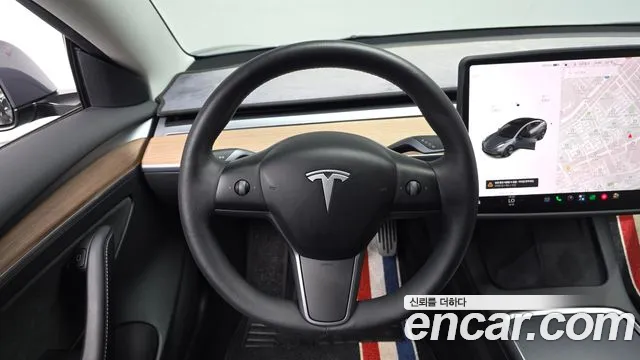 Tesla Model 3 — Фото автомобиля 19