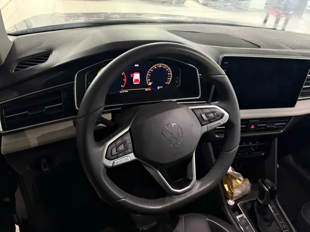 Volkswagen Tiguan L — Фото автомобиля 6