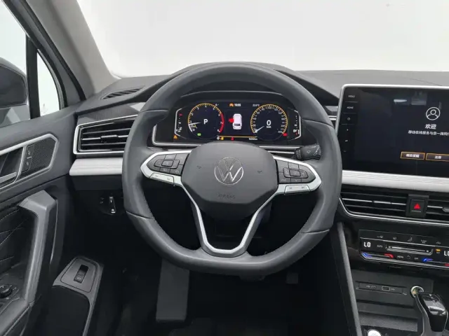 Volkswagen Tiguan L — Фото автомобиля 11