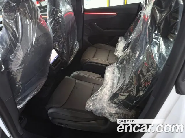 Tesla Model Y — Фото автомобиля 6