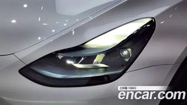 Tesla Model Y — Фото автомобиля 21
