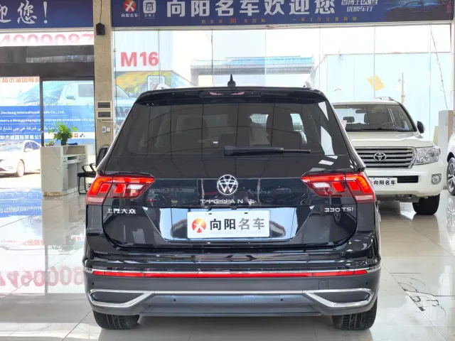 Volkswagen Tiguan L — Фото автомобиля 4