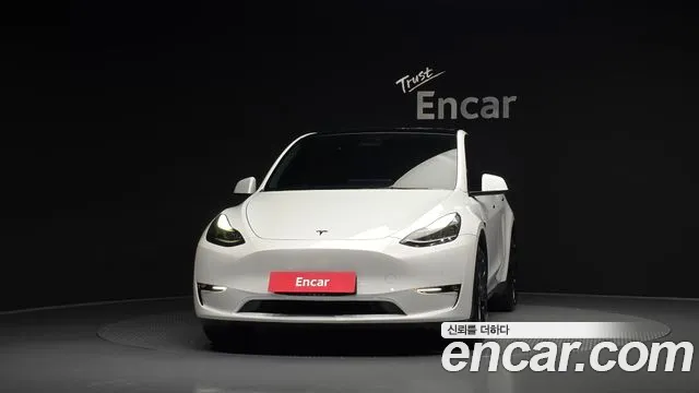 Tesla Model Y — Фото автомобиля 3