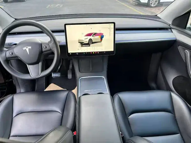 Tesla Model Y — Фото автомобиля 7