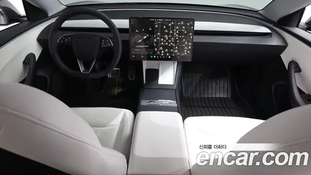 Tesla Model 3 — Фото автомобиля 9