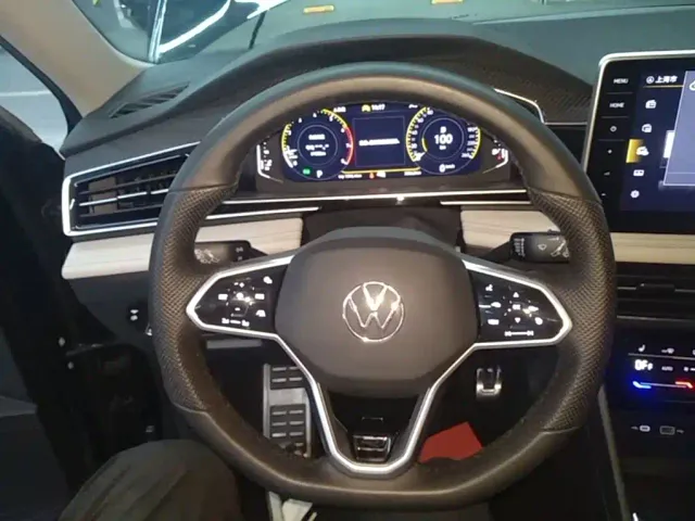 Volkswagen Tiguan L — Фото автомобиля 10