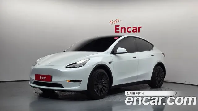 Tesla Model Y — Фото автомобиля 9