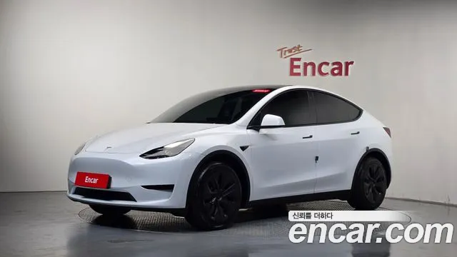 Tesla Model Y — Фото автомобиля 8