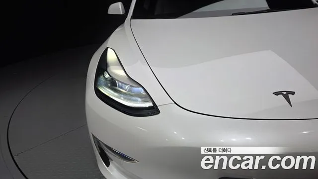 Tesla Model 3 — Фото автомобиля 7