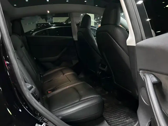 Tesla Model Y — Фото автомобиля 7