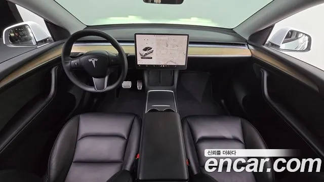 Tesla Model Y — Фото автомобиля 7