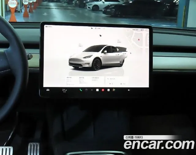 Tesla Model Y — Фото автомобиля 13