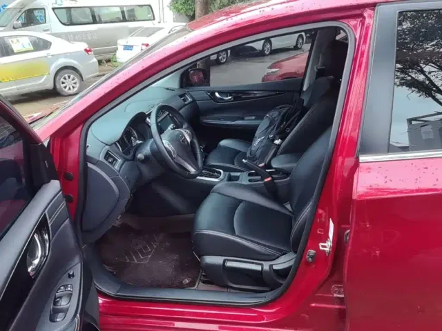 Nissan Tiida — Фото автомобиля 14