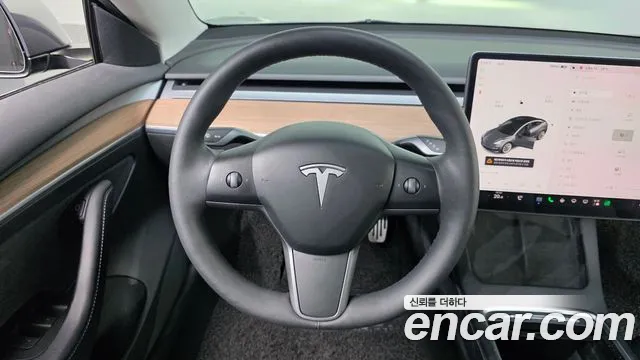 Tesla Model 3 — Фото автомобиля 18