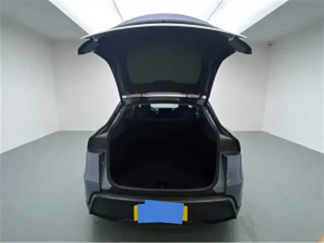 Tesla Model Y — Фото автомобиля 15
