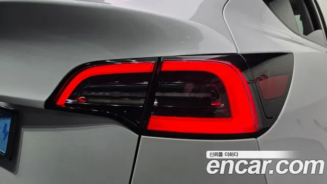 Tesla Model Y — Фото автомобиля 7