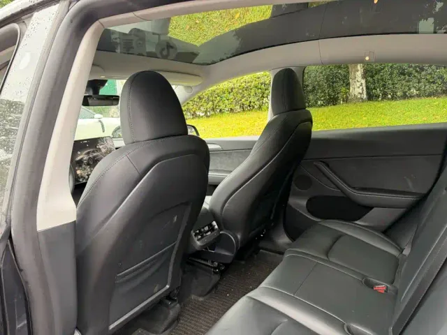 Tesla Model Y — Фото автомобиля 11