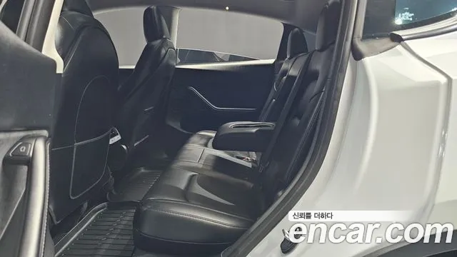 Tesla Model Y — Фото автомобиля 12