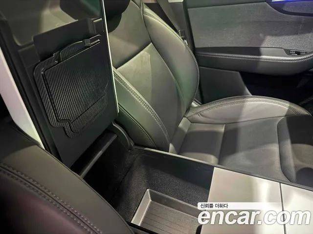 Tesla Model Y — Фото автомобиля 16