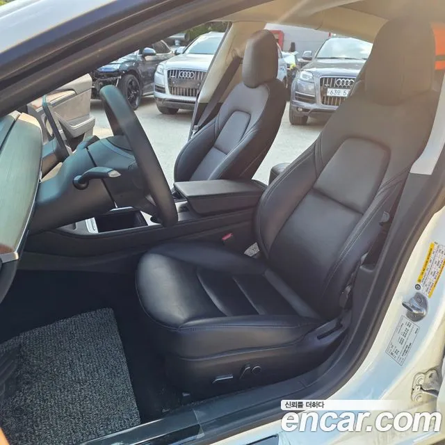 Tesla Model 3 — Фото автомобиля 9