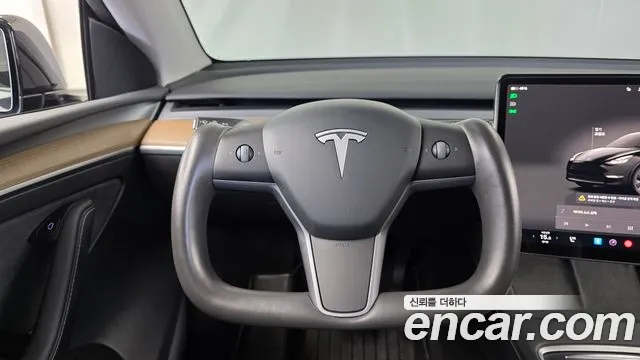 Tesla Model Y — Фото автомобиля 18