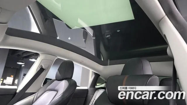 Tesla Model Y — Фото автомобиля 16