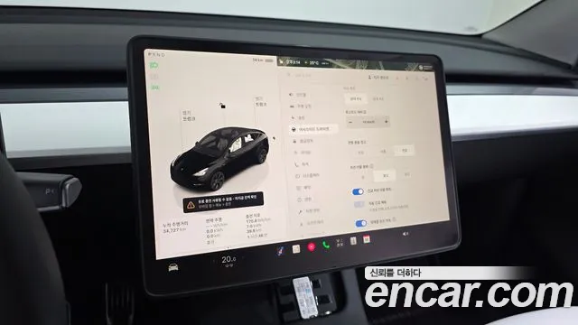 Tesla Model Y — Фото автомобиля 23
