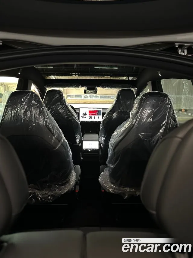 Tesla Model Y — Фото автомобиля 7