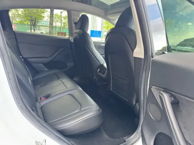 Tesla Model Y — Фото автомобиля 12