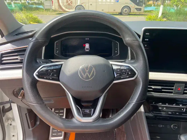 Volkswagen Tiguan L — Фото автомобиля 10