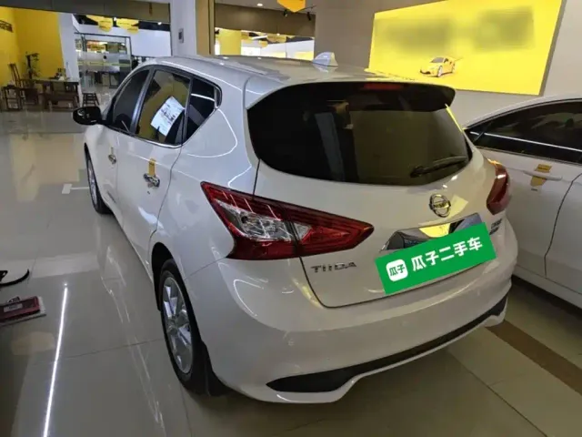 Nissan Tiida — Фото автомобиля 4