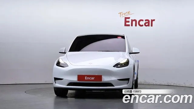 Tesla Model Y — Фото автомобиля 3