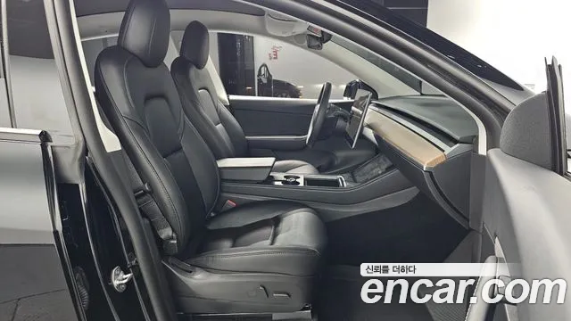 Tesla Model Y — Фото автомобиля 22