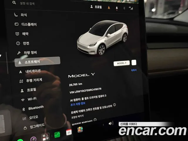 Tesla Model Y — Фото автомобиля 16