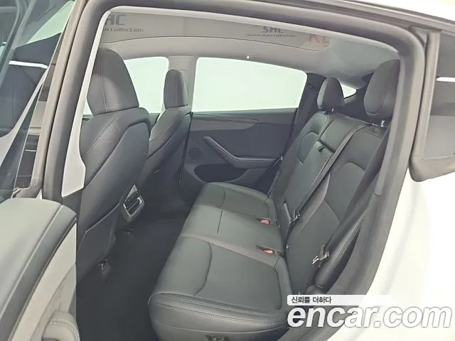 Tesla Model Y — Фото автомобиля 12