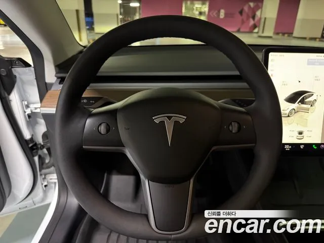 Tesla Model 3 — Фото автомобиля 11