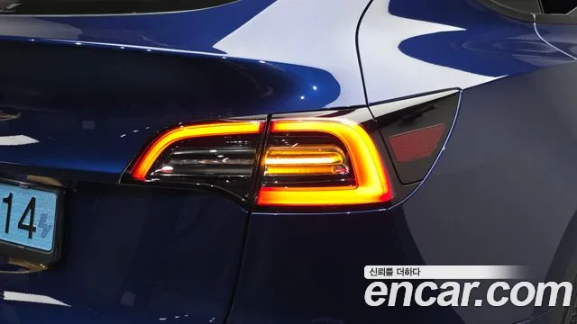 Tesla Model Y — Фото автомобиля 8