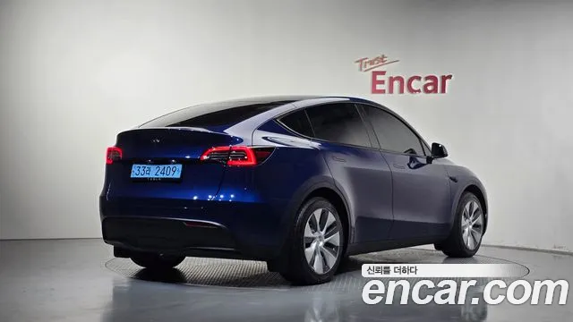 Tesla Model Y — Фото автомобиля 2